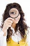 Young Girl Holding Magnifying Glass Stock Photo