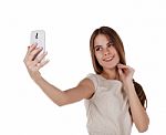 Young Girl Photographing Herself With Mobile Phone Stock Photo
