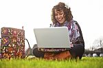 Young Girl Using Laptop Stock Photo