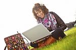 Young Girl Using Laptop Stock Photo