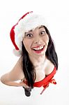 Young Girl Wearing Christmas Hat Stock Photo