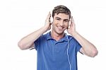 Young Guy Listening To Music Stock Photo