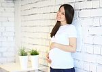 Young Happy Pregnant Woman Stock Photo