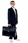 Young Kid Holding Briefcase Stock Photo