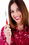 Young Lady Posing With Toothbrush Stock Photo