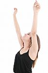 Young Lady With Arms Raising Stock Photo