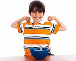 Young Little Boy Showing His Strength Stock Photo
