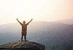 Young Man  Asia Tourist  At Mountain Is Watching Over The Misty Stock Photo