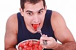 Young Man Eating Water Melon Stock Photo