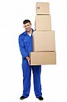Young Man Holding Cardboard Box Stock Photo