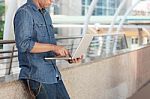 Young Man Holding Notebook Working Stock Photo