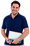 Young Man Holding Notepad Stock Photo