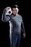 Young Man Holding Soccer Football With Smiling Face Standing Aga Stock Photo