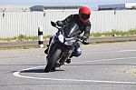 Young Man Riding Motorcycle In Asphalt Road Curve Use For Male A Stock Photo