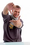 Young Man Showing Directing Hand Gesture Stock Photo