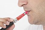Young Man Smokin Electic Cigarette Stock Photo