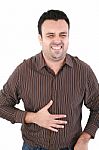 Young Man Suffering From A Bad Stomach Ache Pain Isolated On Whi Stock Photo