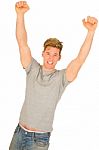Young Man With Arms Up Stock Photo