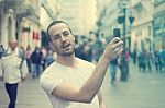 Young Man With Smartphone Stock Photo