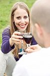 Young Romantic Couple Celebrating With Wine Stock Photo