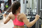 Young Sexy Girl Lifts In The Gym Stock Photo