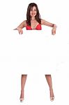 Young Smiling Woman In Red Bikini Holding White Blank Board Stock Photo