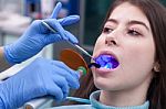 Young Woman At The Dental Office Stock Photo