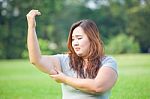 Young Woman Checking Her Arm Fat Stock Photo