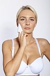 Young Woman Clean Face With Wet Wipes Stock Photo