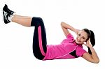Young Woman Doing Crunches Stock Photo