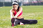 Young Woman Doing Stretching Stock Photo