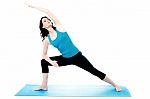 Young Woman Exercise Over White Background Stock Photo