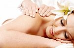 Young Woman Getting Spa Massage Stock Photo