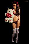 Young Woman With A Teddy Bear Wearing Lingerie Stock Photo