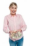 Young Woman With Dollars In Her Hands Stock Photo