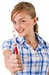Young Women Showing The Toothbrush Stock Photo